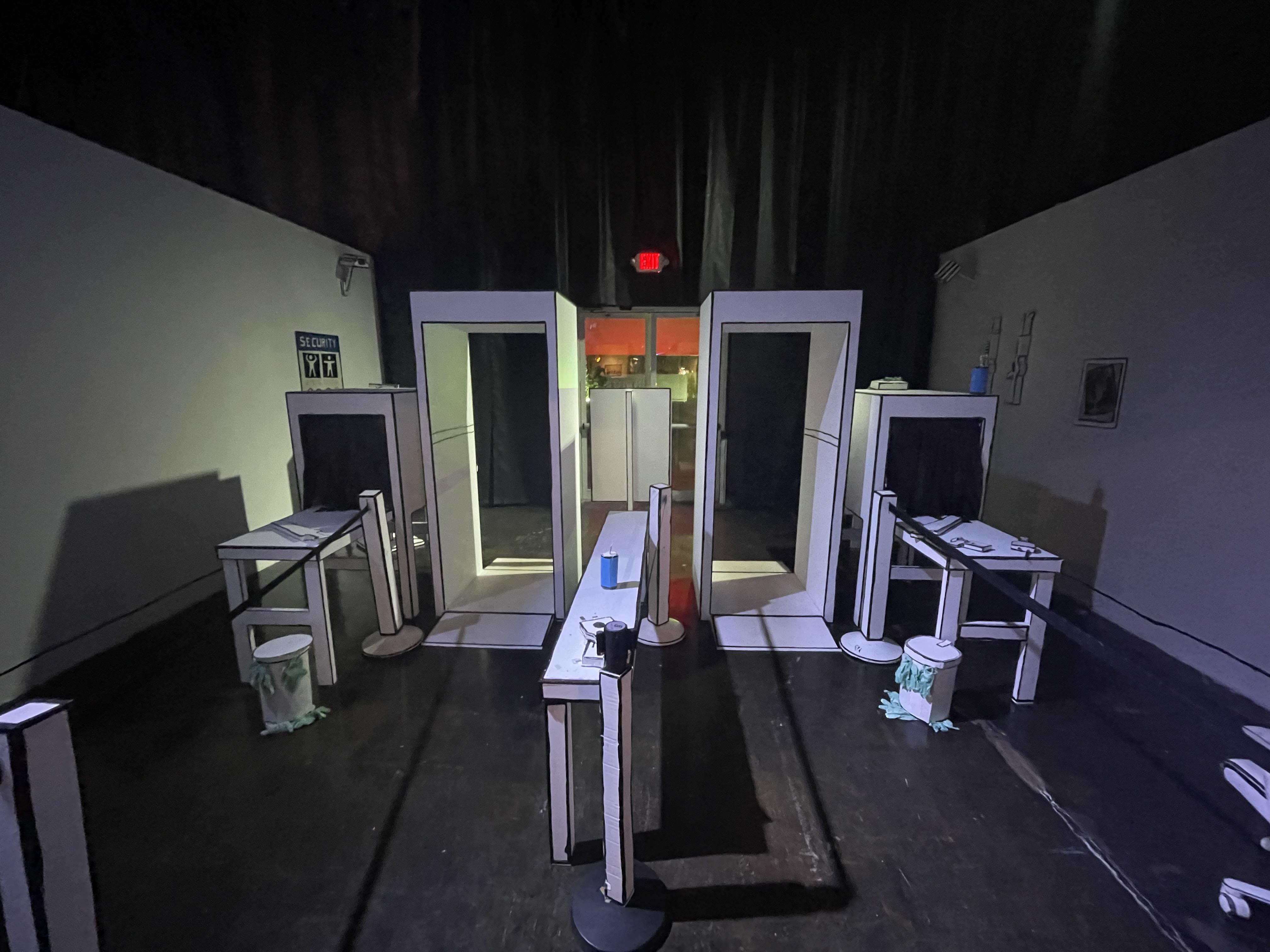Art of Banksy exhibit - Airport security screening replica with 2D-style props