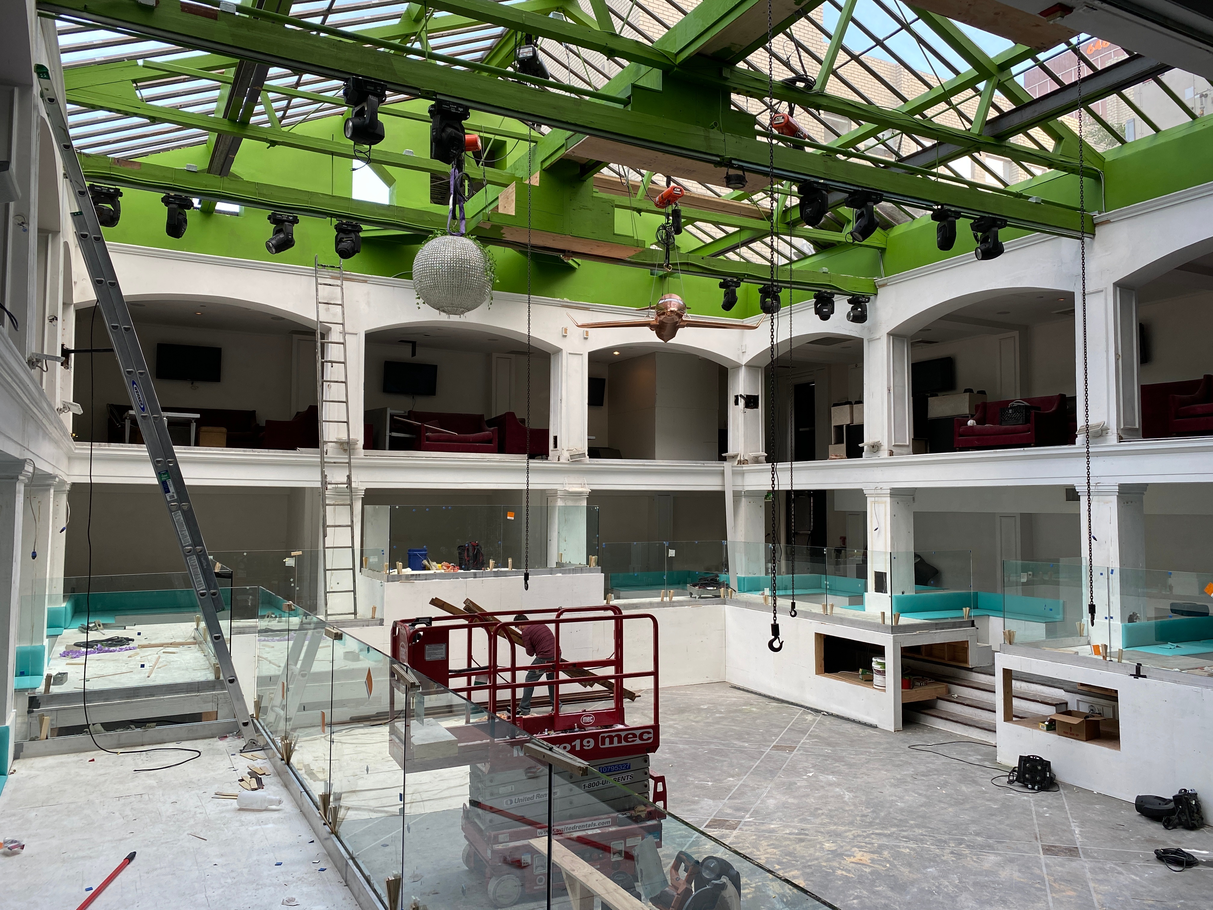 Interior of a venue under construction with rigging